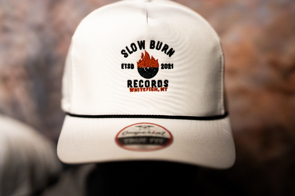Record burn logo white hat in store