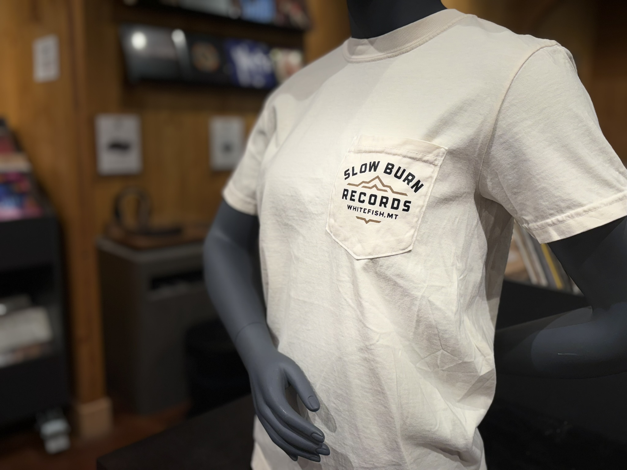 Mannequin in ivory pocket tee with SBR logo