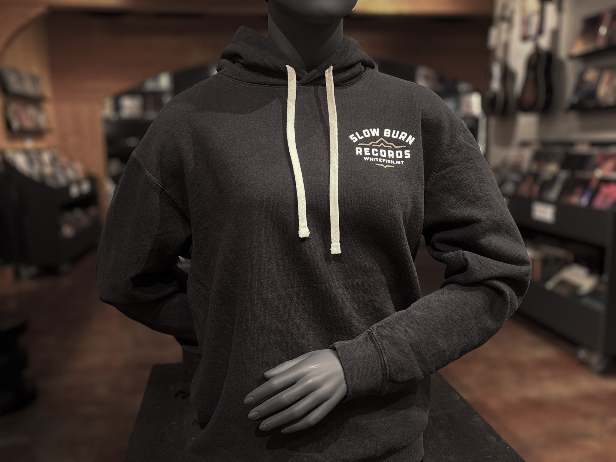Black sweatshirt with "Slow Burn Records" on front