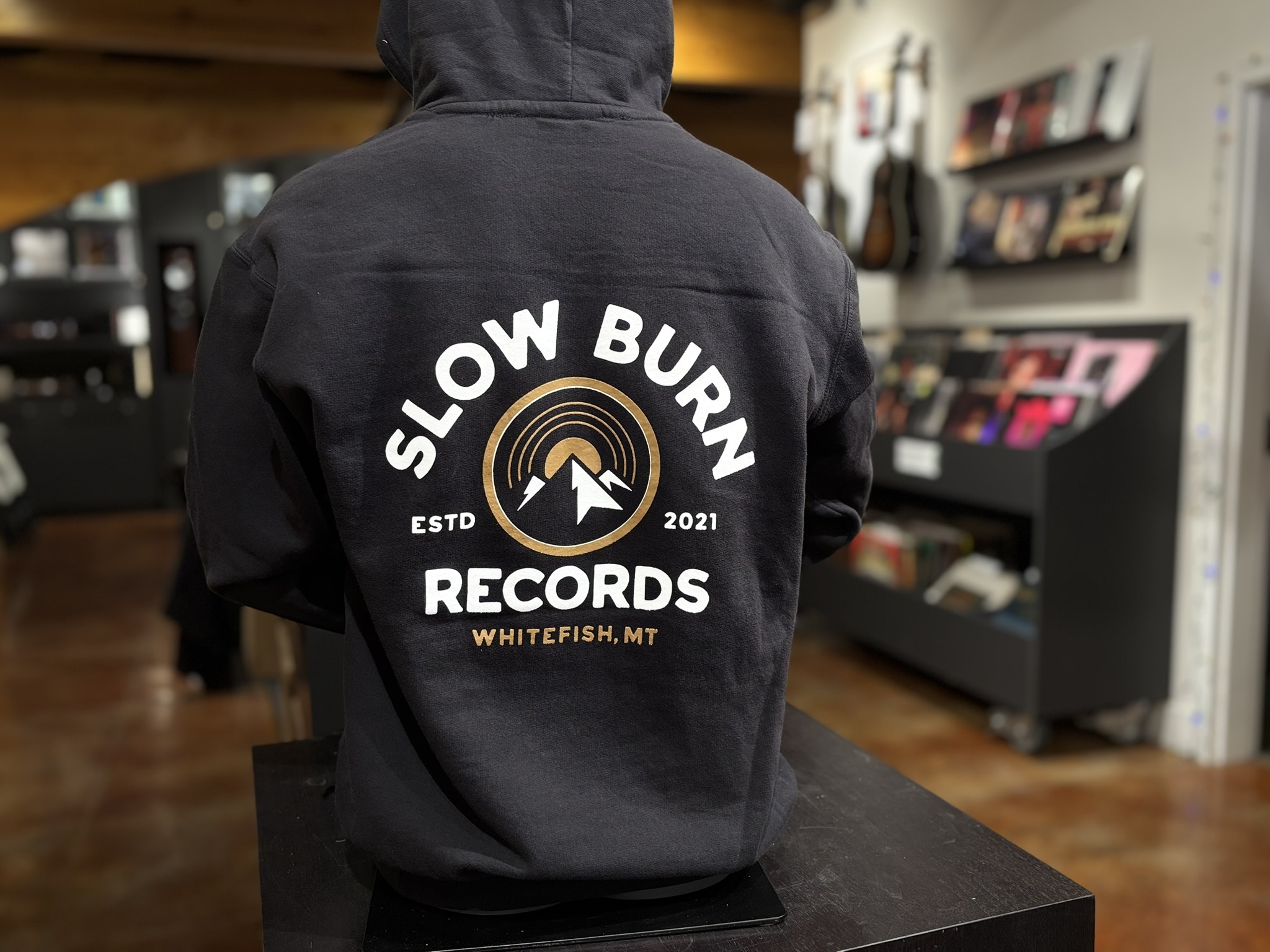 Close-up of large SBR sweatshirt logo on back of sweatshirt