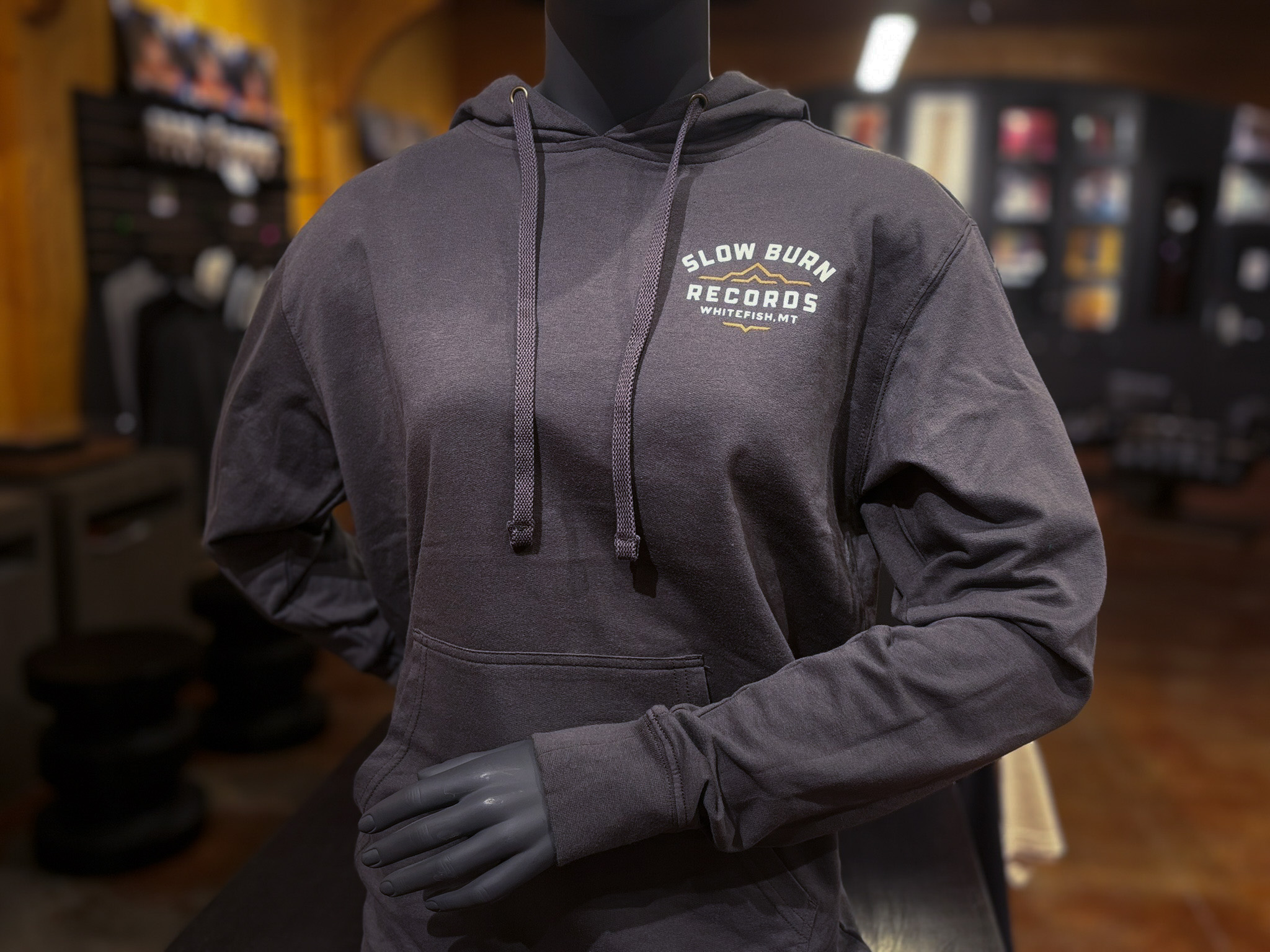 Dark grey hoodie with small SBR logo on front