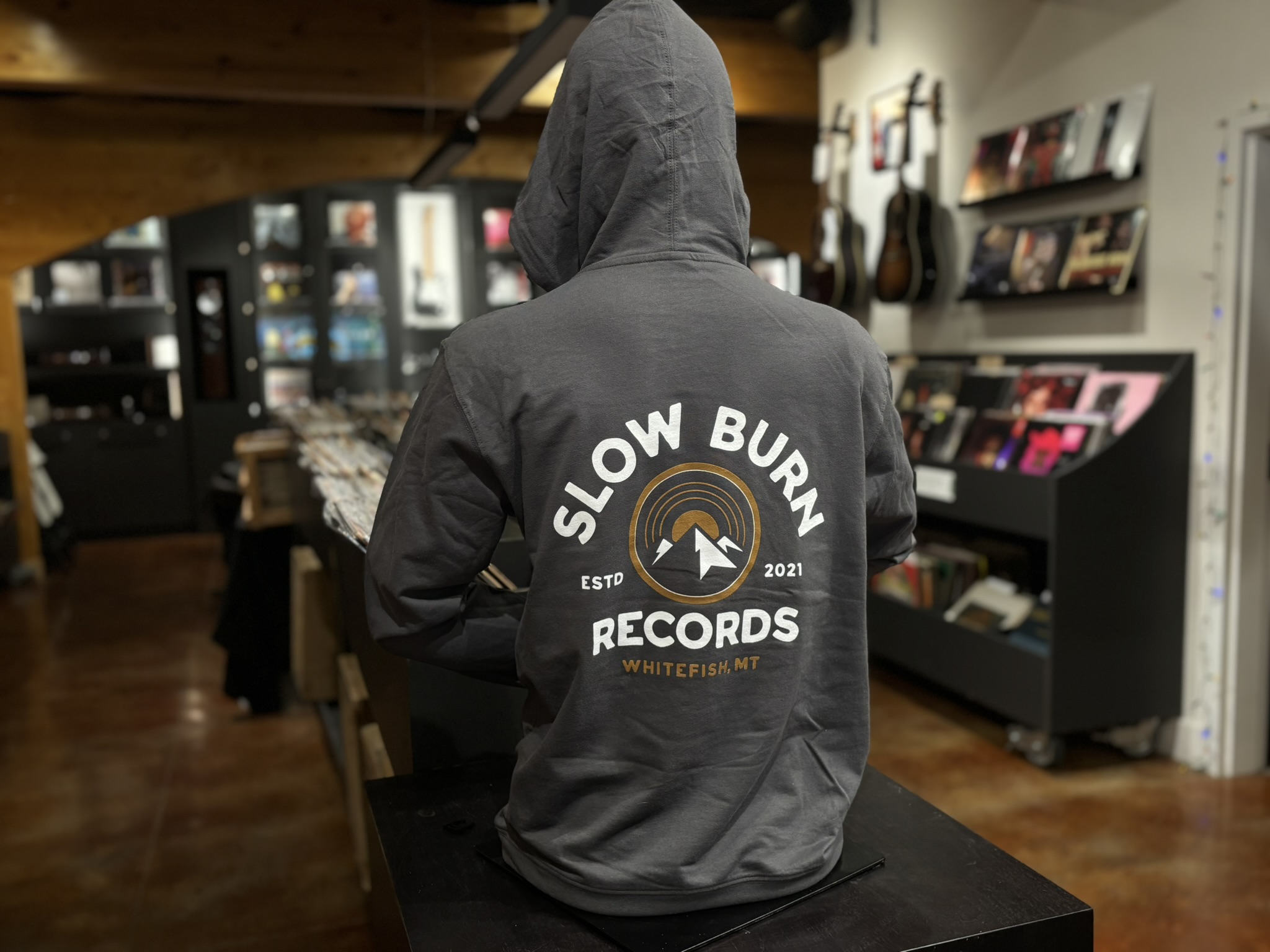 Dark grey sweatshirt with large SBR logo on back